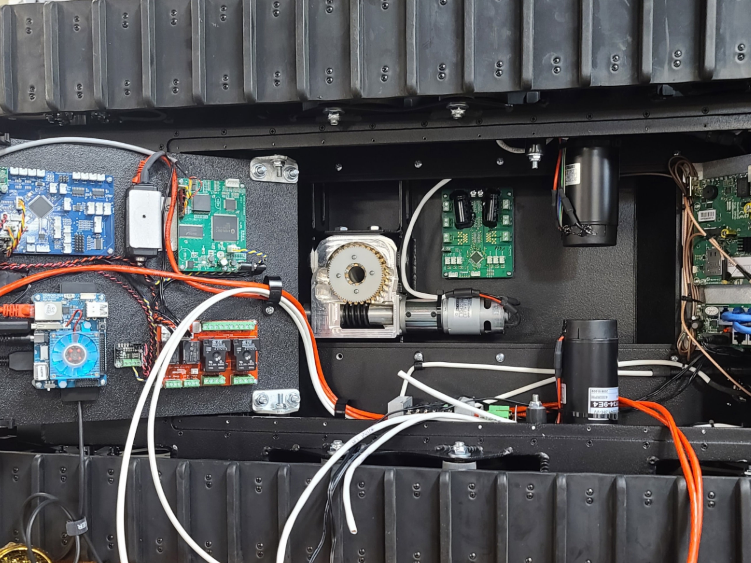 Electrical repair technician working on equipment